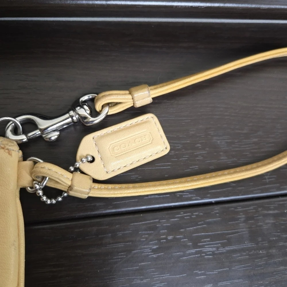 Coach yellow leather wristlet